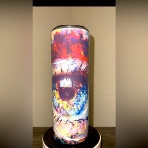 Imagine a tumbler featuring a vibrant watercolor design of an eyeball.